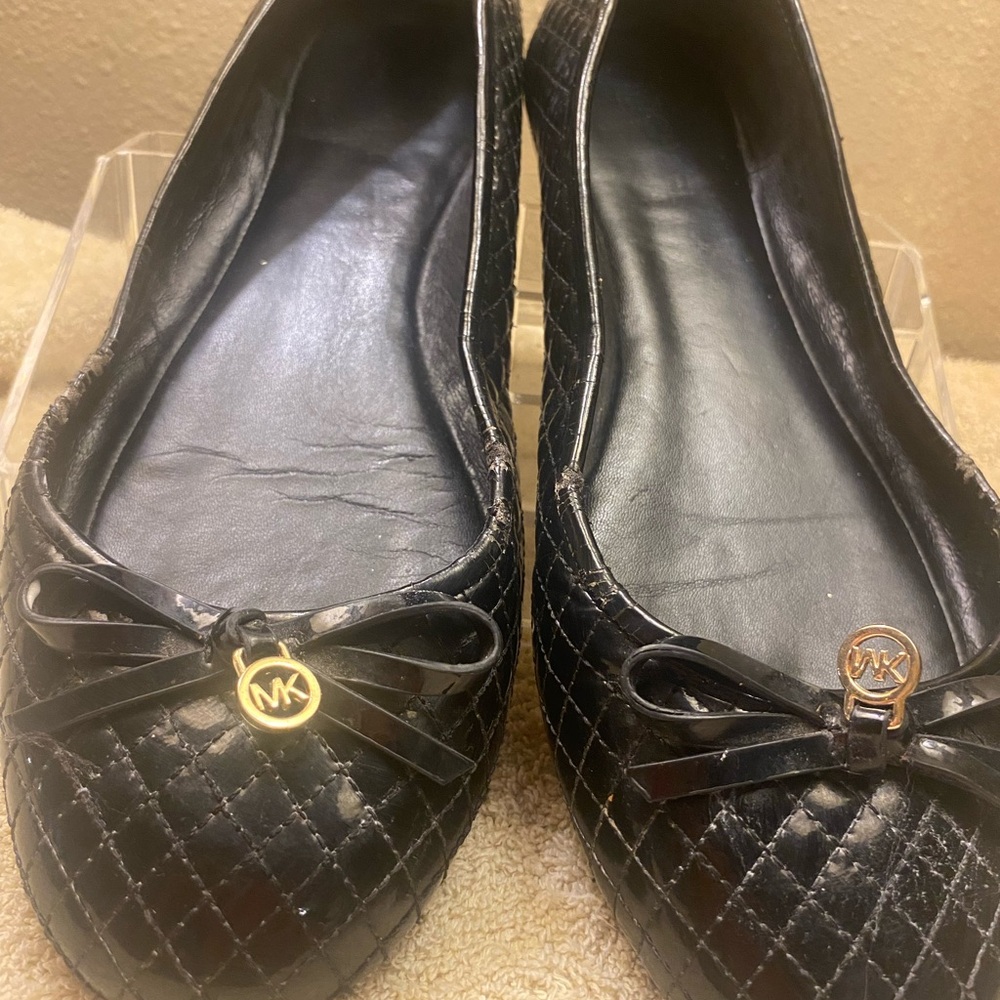 Michael Kors Black Quilted Loafers with Gold Accents